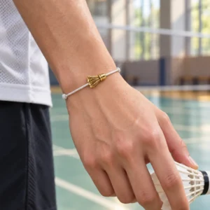 Bracelet Badminton BONIDAY – finition or porté au poignet